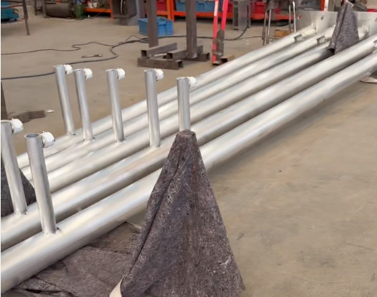 Aluminum alloy poles with equipment mounting brackets in the workshop