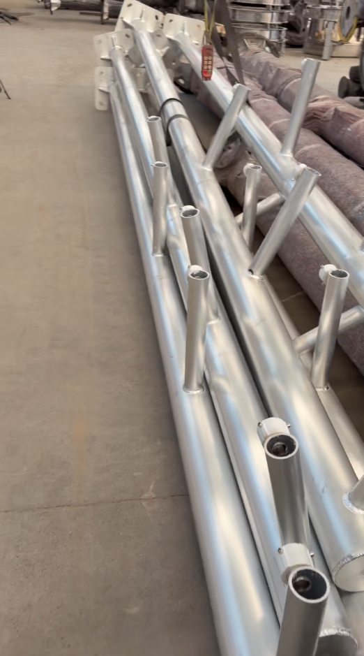Equipment mounting brackets and openings on aluminum alloy poles